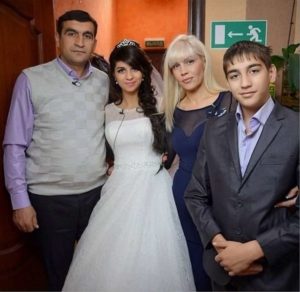Светлана Устименко с мужем и детьми